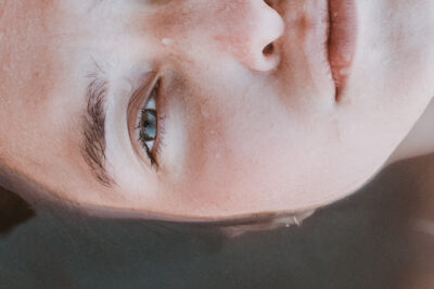 woman with water droplets on face