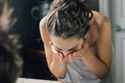 woman washing face