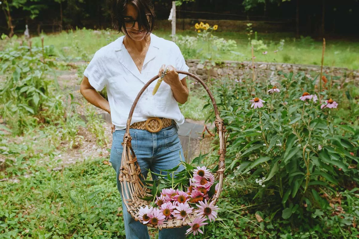 Annmarie with harvested herbs