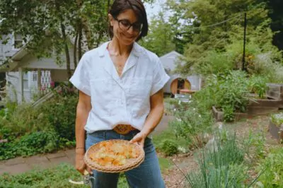 Annmarie with a basket of calendula